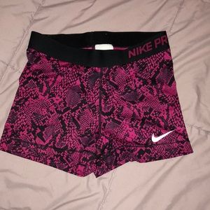 Pink snake Nike Pros